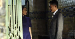 Grandmaster Engaging In A Sophisticated Chess Game Wallpaper