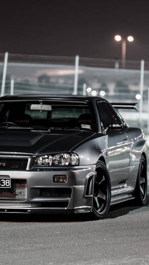 Gray Nissan Skyline - A Subtle Symbol Of Jdm Style Wallpaper