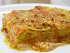 Greasy Plate Of Lasagna Alla Bolognese Wallpaper