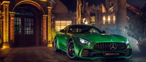 Green Amg Parked Outside The Door Wallpaper