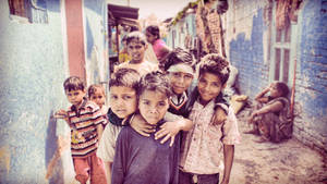 Group Of Boys In Village Wallpaper