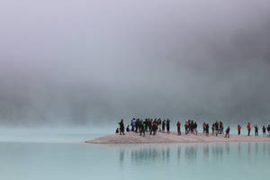 Group Of People On An Islet Wallpaper