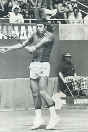 Guillermo Vilas In Action - A Moment From Tennis History Wallpaper