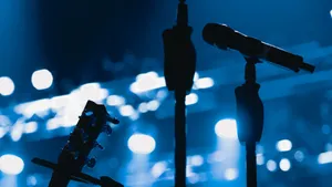 Guitarist's Microphone On The Stage Wallpaper