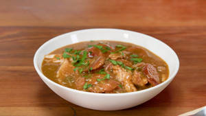 Gumbo In White Bowl On Wood Wallpaper