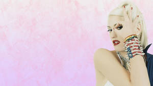 Gwen Stefani Exuding Style In Pink Attire Wallpaper