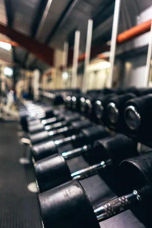 Gym Dumbbell Rack Focus Wallpaper