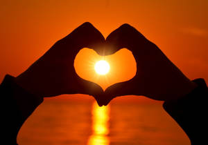 Hand Heart Sunset Wallpaper