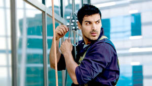 Hanging On Rope John Abraham Hd Wallpaper