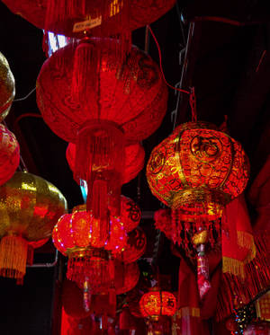 Hanging Red Chinese Lanterns During Night Wallpaper