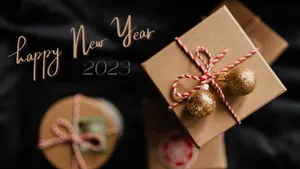 Happy New Year 2023 Holiday Gift Boxes Wallpaper