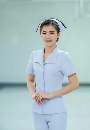 Happy Young Asian Nursing Woman Wallpaper