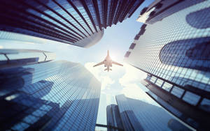 Hd Plane Flying Above Buildings Wallpaper