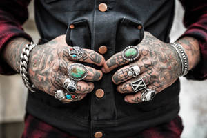 Hd Tattoo And Multiple Rings Wallpaper