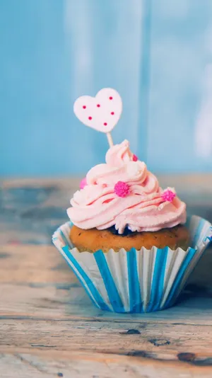 Here's To Indulging In A Sweet Treat With Your Iphone! Wallpaper