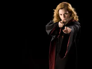 Hermione Granger - Celebrating Her Love Of Reading Wallpaper