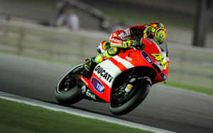 High-speed Action With Vr46 At Qatar Motogp Test Drive Wallpaper