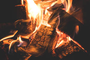 High Temperature Burning Wooden Coal Wallpaper