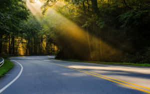 Highway With A Curving Road Wallpaper