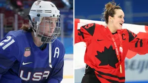 Hilary Knight Dueling On Ice With Marie-philip Poulin Wallpaper
