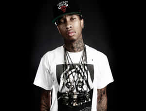 Hip Hop Artist Tyga Shows Off A Variety Of Tattoos Wallpaper
