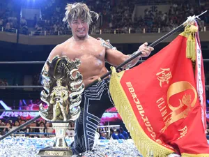 Hiroshi Tanahashi Victory Pose With Trophy And Flag Wallpaper