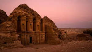 Historical Place Petra Against Pink Skies Wallpaper