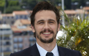 Hollywood Actor James Franco Smiling Wallpaper