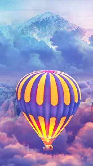 Hot Air Balloon Surrounded By Clouds Wallpaper