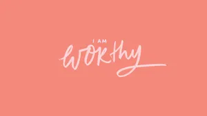 I Am Worthy Handwritten Lettering On A Pink Background Wallpaper