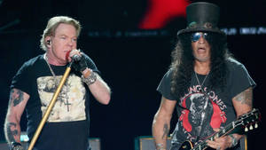 Iconic Rock Band Guns N' Roses Live On Stage Wallpaper