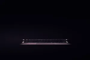 Illuminated Dark Laptop Keyboard Wallpaper