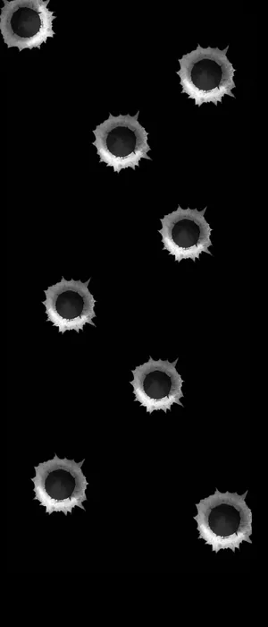 Impact Of Power: Bullet Holes Left After Firing Wallpaper