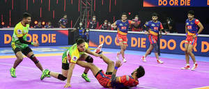 Intense Kabaddi Tackle Wallpaper