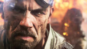 Intense Soldier Closeup Battlefield Wallpaper