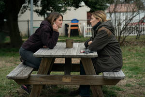 Intriguing Scene Between Carrie Layden And Marianne In Hbo's Mare Of Easttown Wallpaper