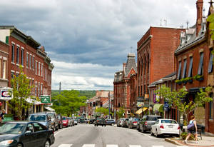 Inviting Cityscape Of Maine Street, Belfast, Usa Wallpaper