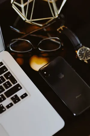 Iphone Desk Close Up With Phone Wallpaper