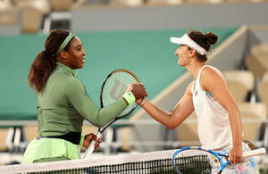 Irina-camelia Begu And Serena Williams Wallpaper