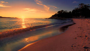 Island Beach On Orange Sunset Wallpaper