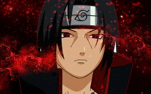 Itachi Uchiha With His Powerful Mangekyou Sharingan Wallpaper