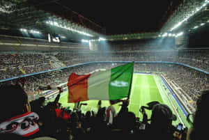 Italian Football Match At Stadium With Flag Wallpaper
