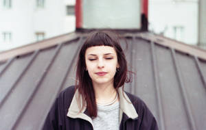 Italian Girl On Rooftop Wallpaper