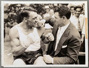 Italian Professional Boxer Primo Carnera With Jack Dempsey Wallpaper