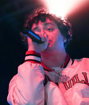Jack Harlow Holding Microphone Wallpaper