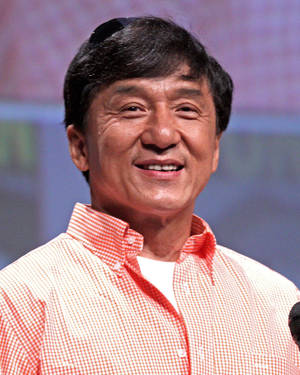 Jackie Chan In Pink Polo Wallpaper