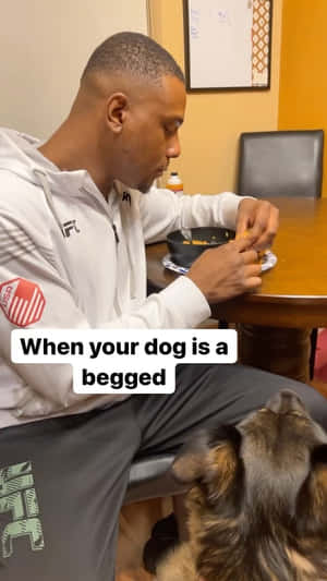 Jamahal Hill Eating With Dog Wallpaper