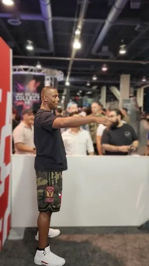 Jamahal Hill, The Renowned Ufc Fighter, Reaching Out In Confidence Wallpaper