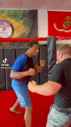 Jamahal Hill With Knuckles In Position Wallpaper