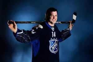 Jamie Benn Black And Blue Uniform Wallpaper